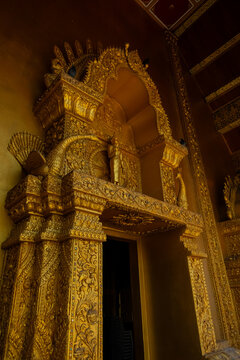 Golden Naga sculptures at Wat Sri Panton in Nan Province, Thailand, showcasing ornate Buddhist architecture, sacred craftsmanship and Northern Lanna heritage