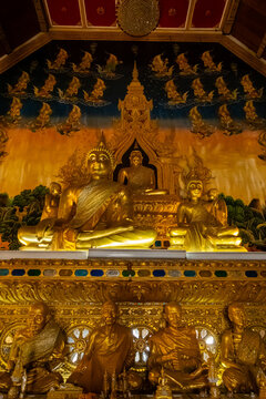 Golden Naga sculptures at Wat Sri Panton in Nan Province, Thailand, showcasing ornate Buddhist architecture, sacred craftsmanship and Northern Lanna heritage
