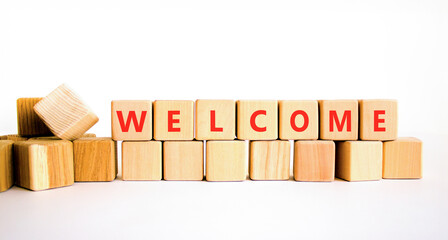 Welcome word symbol. Concept word Welcome on beautiful wooden blocks. Beautiful white table white background. Business welcome word concept. Copy space. © Dzmitry