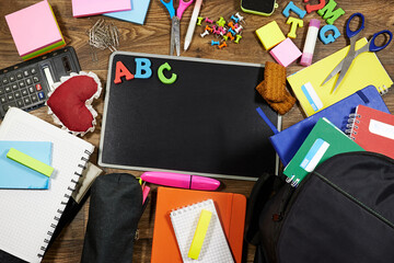 Back To School Flat Lay With Chalkboard, ABC Letters And Colorful School Supplies © hadjanebia