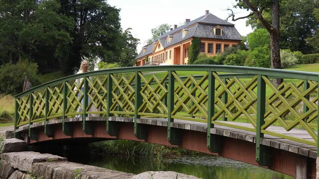 Woman on a bridge in the park