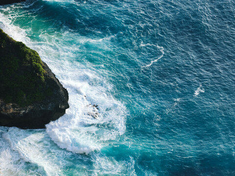waves crashing on rocks