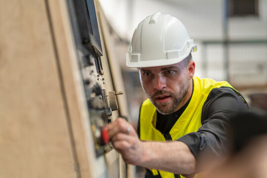 Workers Factory or Engineering work at factory site check up machine or products in site. Foreman or Technician checking Material or Machine on Plant. Heavy industry factory concept.