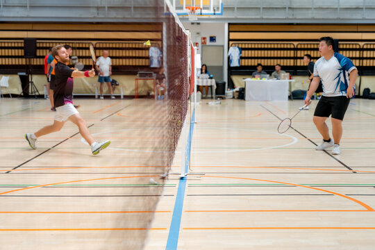 Badminton tournament match in indoor sports hall