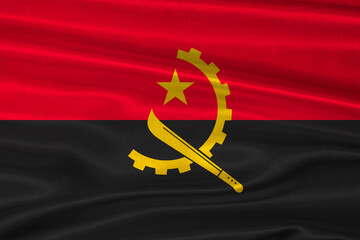 Angolan flag textured with fabric background. Flag of Angola with a soft fabric texture