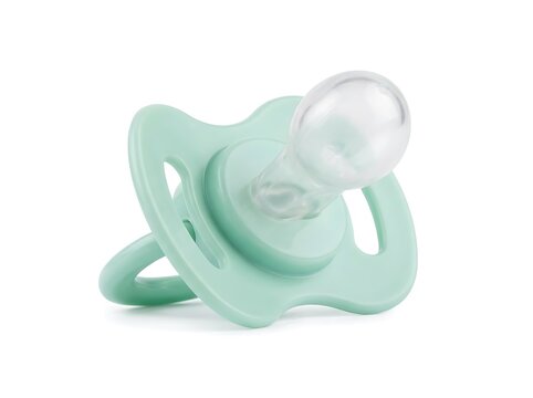 Mint green silicone baby pacifier with orthodontic shape isolated on white background