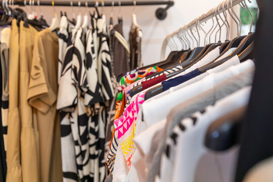 Fashion clothing collection displayed on boutique garment racks