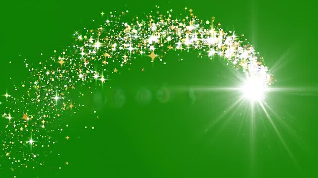 Sparkling glitter trail with bright starburst light moves dynamically across green screen background, abstract festive motion graphic.