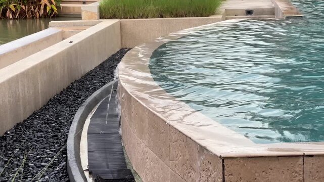 Water overflow out of the swimming pool
