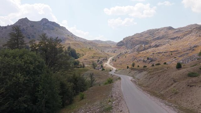 Aerial Drone Flyover of Winding Mountain Road on Visocica