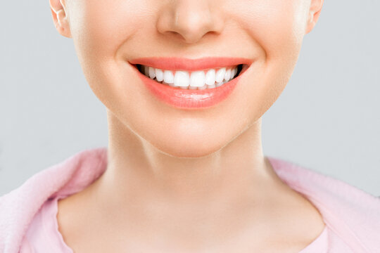 Perfect White Smile of a Young Woman Close Up