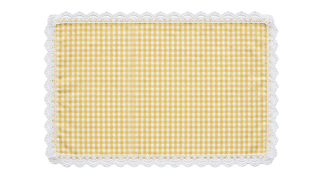 Butter yellow gingham check fabric placemat with white scalloped lace border isolated on white background, top view