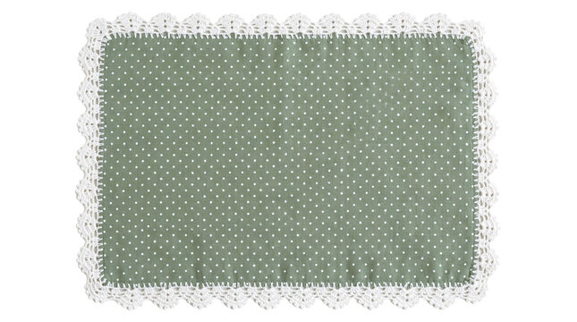 Sage green linen placemat with white polka dots and white crochet lace border isolated on white background