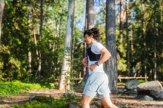 Side Profile Runner On Trail