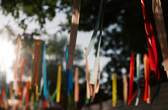 Colorful Ribbons Hang in the Sunlight During a Festive Event