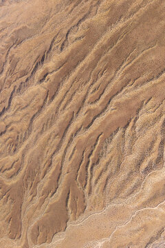 Abstract aerial texture of eroded Atacama Desert terrain