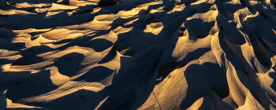 Sunlit pumice desert formations in Catamarca, Argentina