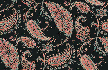 Seamless repeating pattern with paisley motifs placed at different angles, balanced by smaller floral elements and filler © Venkatsai