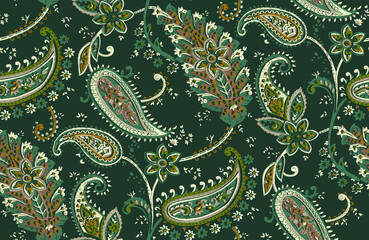 Seamless repeating pattern with paisley motifs placed at different angles, balanced by smaller floral elements and filler © Venkatsai