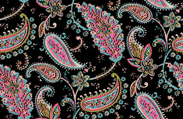 Seamless repeating pattern with paisley motifs placed at different angles, balanced by smaller floral elements and filler © Venkatsai