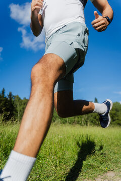 Runner Moving Through Tall Grass