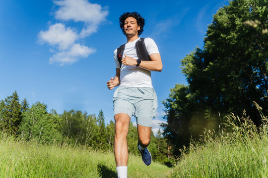 Active Trail Runner In Nature