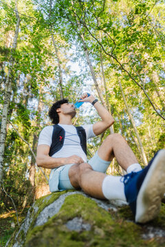 Drinking From Blue Water Flask