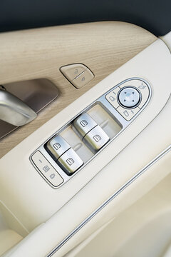 Electric car door controls with window and mirror switches