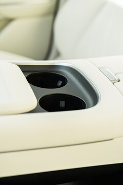 Electric car center console with cup holder detail