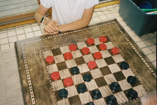 Girl play Vintage Checker board game Film 