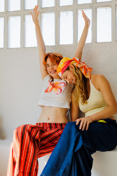 Women having fun laughing celebrating together