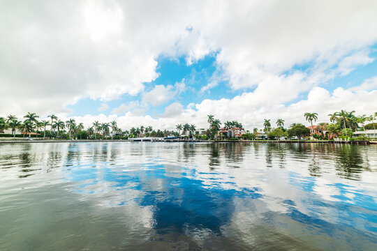 Luxury waterfront homes in Fort Lauderdale with cloud reflections
