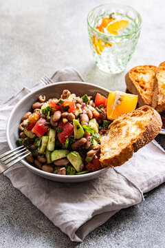 Bean and vegetable salad with cucumber tomato and coriander