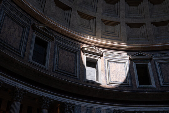 Sunlight illuminates ancient roman Pantheon interior architecture