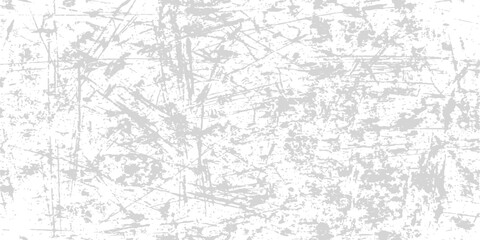 Obraz premium Grungy distressed texture with light grey scratches and speckles on a white background for grunge effects