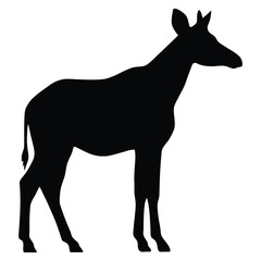 Fototapeta premium A detailed black silhouette of a young antelope stands in profile silhouette