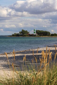 Picturesque maritime landscape featuring the Bulker lighthouse and coastline in Strande, Schleswig-Holstein