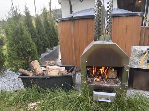 Wood burning outdoor stove fire