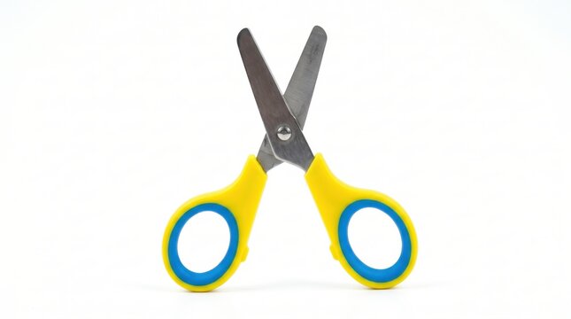 Yellow and blue children safety scissors isolated on white background.