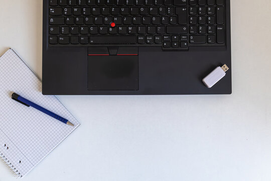 Flat lay image of a laptop with card reader and copy space