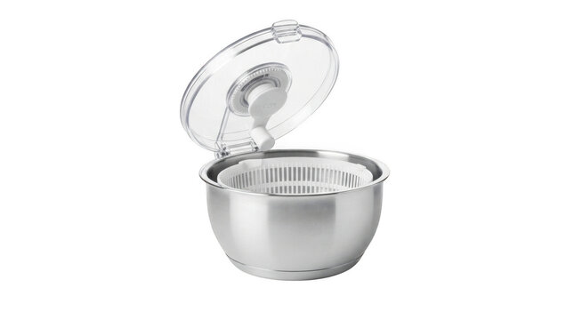Modern stainless steel salad spinner isolated on transparent background for kitchen appliance product marketing