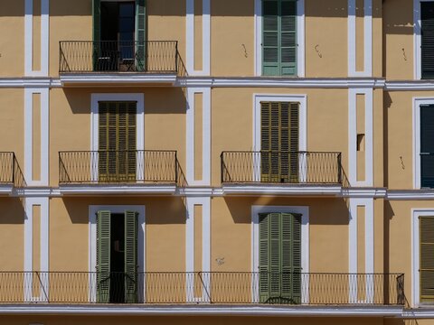 Symmetric Yellow Facade Details