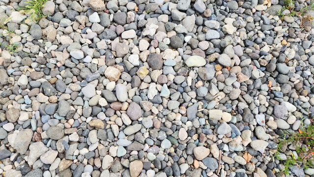 Colorful pebbles and sand, textured exteriors, natural patterns, and decorative ground backgrounds.