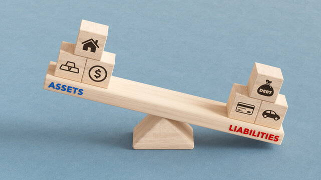 Wooden Seesaw Balancing Financial Assets and Liabilities Heavy Concept