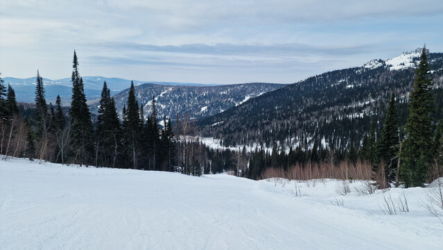Ski Resort with Chairlift and Snowy Slopes.