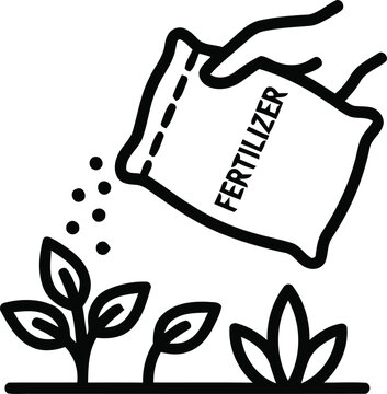 Hand pouring fertilizer on growing plant
