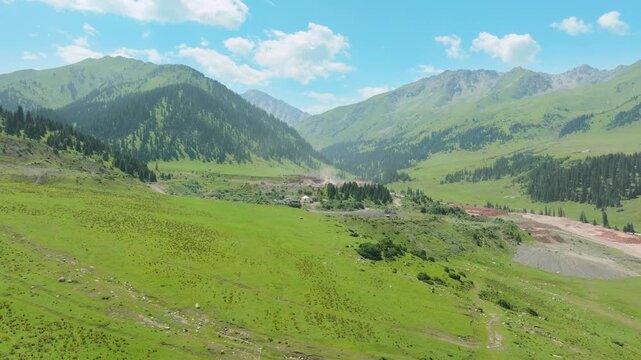 Aerial Sideways Panning Shot Over Mountain Scenery in Jyrgalang, Kyrgyzstan, in Summer