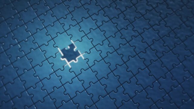 Final Puzzle Piece Fitting into Place on Blue Jigsaw Grid