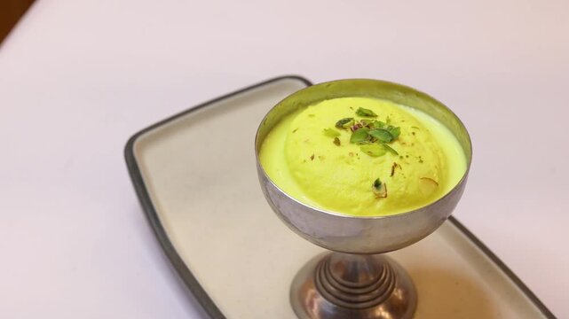 Ras malai an indian dessert garnished with dry fruits 