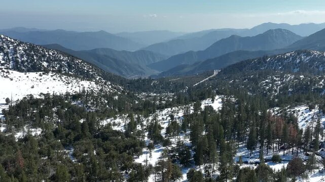 Breathtaking Aerial Views of Snowy Mountain Ridges in Winter R in San Gabriel Mts California USA